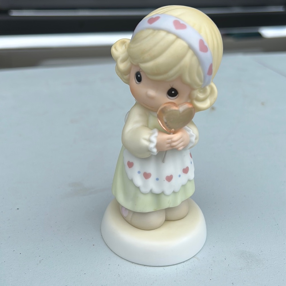 Precious Moments Figurine: “You Have The Sweetest Heart”.
